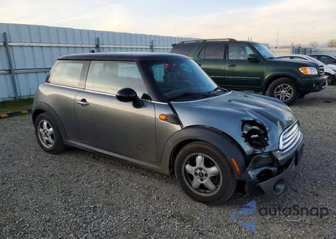 2010 Mini Cooper z USA, uszkodzony, nr VIN WMWMF3C5XATZ61422